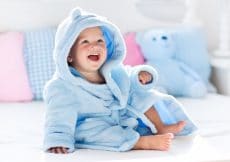 Badcape of badjas met naam voor de baby