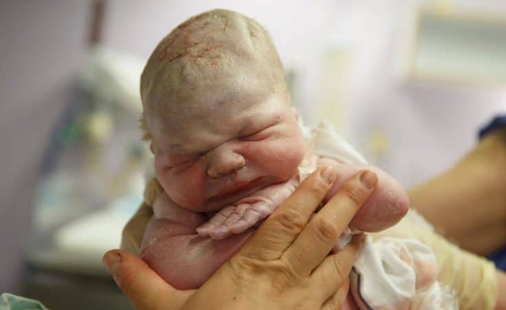 foto’s tijdens de bevalling geboortefotograaf
