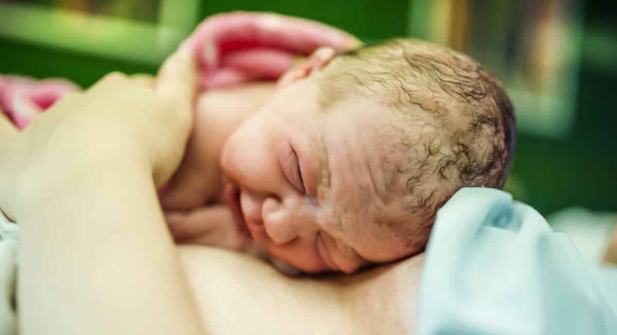 geboortefotograaf kiezen voor foto's tijdens de bevalling