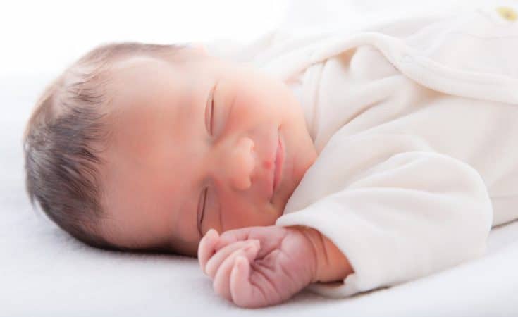 tog-waarde bij aankleden slapen van de baby
