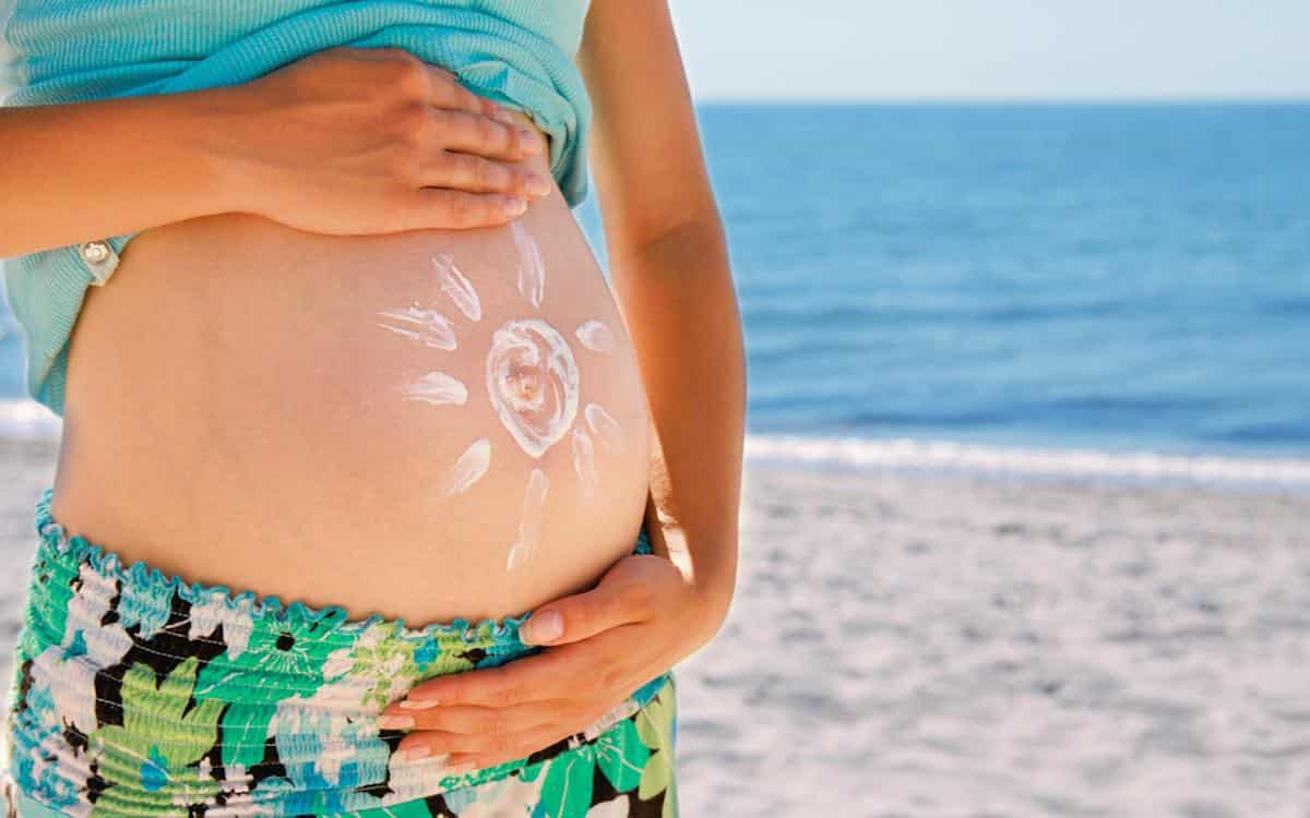 zwanger zomer strand tips